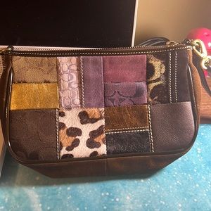 Brown suede Coach shoulder bag for sale. Multi Print shoulder bag.